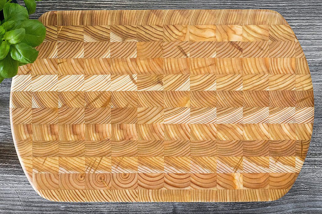 Larch Wood handmade end grain cutting boards serving cheese charcuterie boards made in Canada Nova Scotia heirloom art